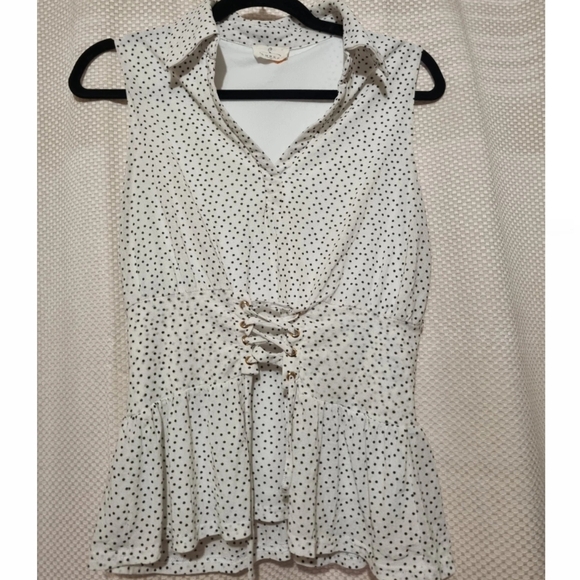 Ember Tops - Elegant White and Black Sleeveless Peplum Blouse